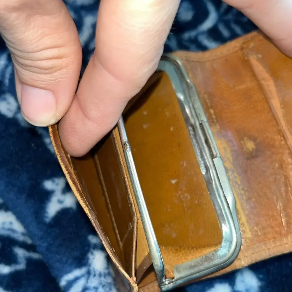 1898 Antique hand-tooled Leather billfold wallet featuring a floral pattern